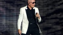 V Letňanech vystoupí americký rapper Pitbull, fanoušci na jeho koncerty nosí umělé plešky
